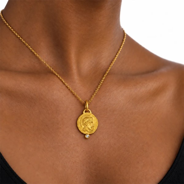Athena Pendant | 24k gold pendant on a model