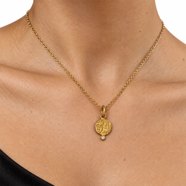 Istros Pendant | 24k gold pendant on a model