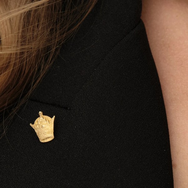 Taj Brooch | 18k gold brooch on a model