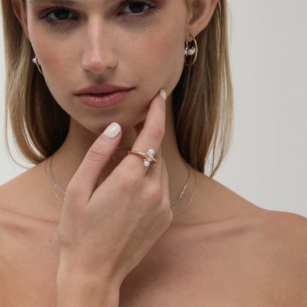Mireya Ring | 18k gold ring on a model, showing the pearl face